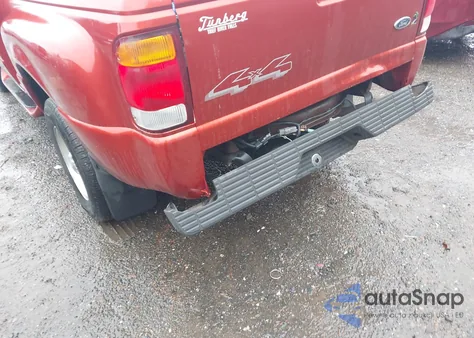 1999 Ford Ranger Super Cab z USA, uszkodzony, nr VIN 1FTZR15V6XPB00323